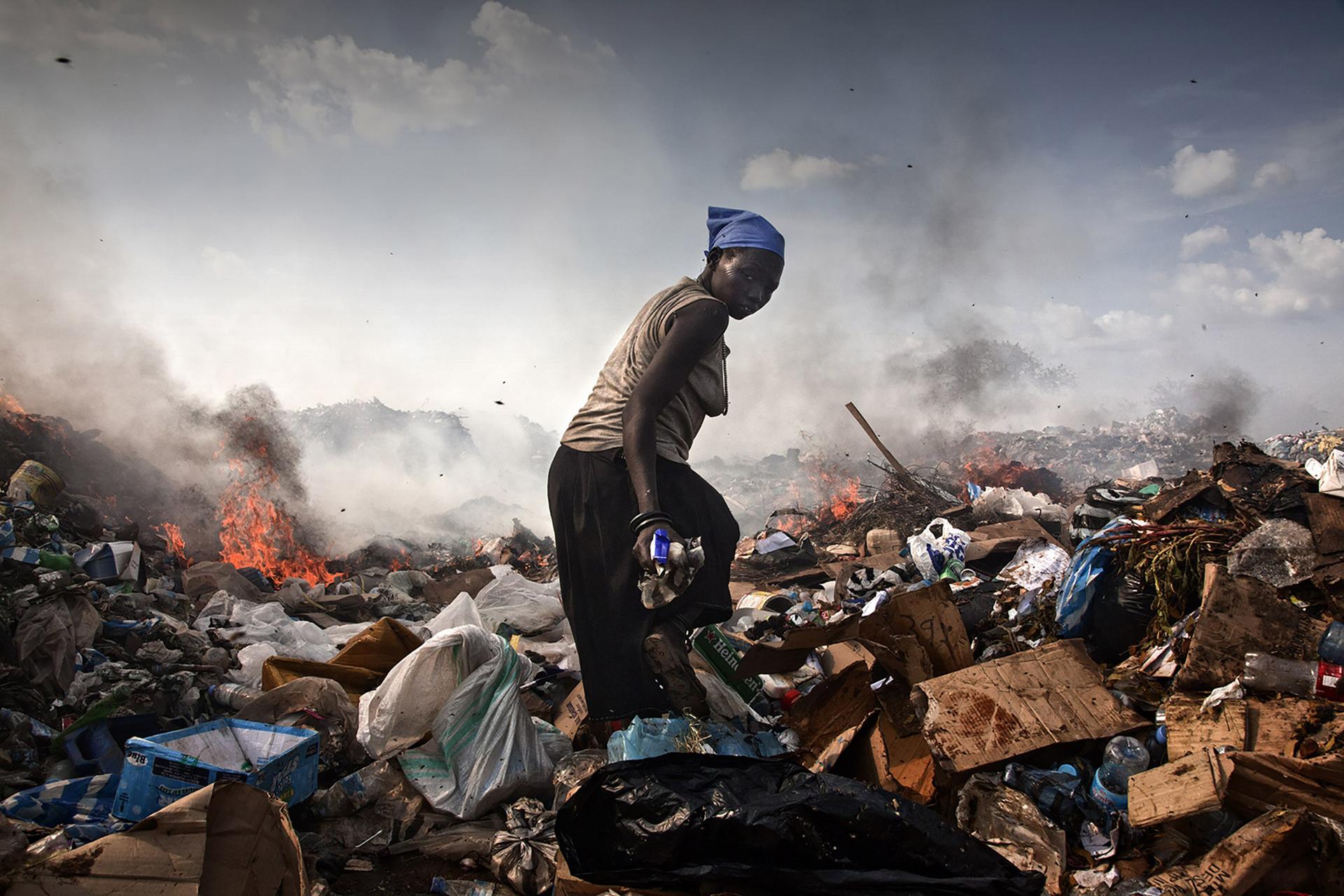 A young woman living in Juba Landfill, shot as part of a project for the Italian NGO CESVI that aims to improve the quality of security and pollution standards. Southern Sudan, October/November 2010. ©Stefano De Luigi / VII