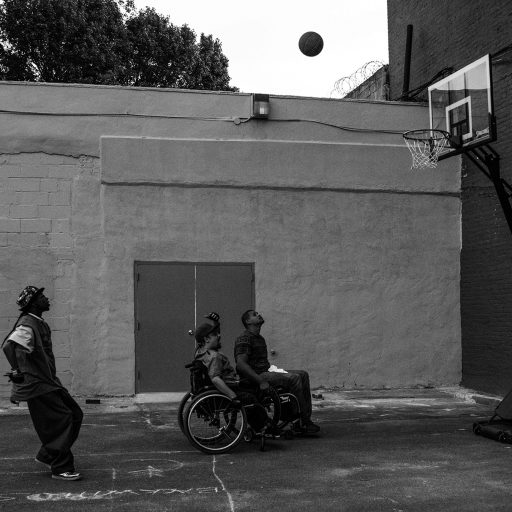 Nolan Ryan Trowe, VII Mentor Program, November 2017, Brooklyn, New York: Alex Haly plays basketball with his friends at a recreation center for disabled people.