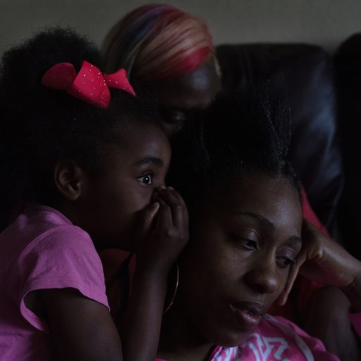 Nolan Ryan Trowe, VII Mentor Program, June 4, 2019; Harlem, New York; While relaxing in their apartment, Azalia Mallory Bing's daughter Tia whispers in her ear.
