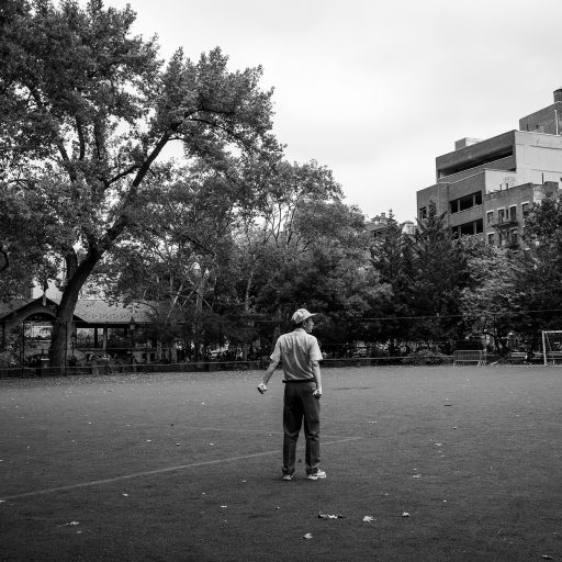 Nolan Ryan Trowe, VII Mentor Program, October 2018 New York, New York; A person stretches in Columbus Park in Manhattan.