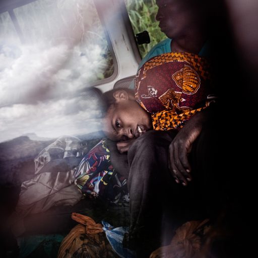 Manigue Nimvuriki, 18, is transported by a Médecins Sans Frontières, MSF, land cruiser to the hospital in M'Pati, North Kivu province, Democratic Republic of the Congo, DRC, on Oct, 23, 2009. Nimvuriki, who was suffering from Peritonite, treated traditionally, died early in the morning.