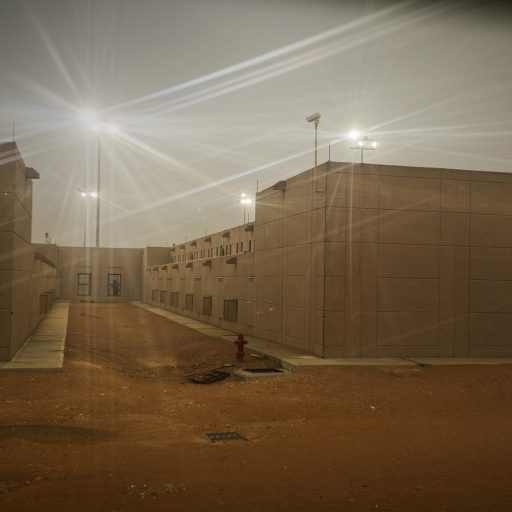 The Al Haier prison yard is visible in Riyadh, Saudi Arabia on Jan. 13, 2008. The prison compound in Al Haier, a small town on the outskirts of Riyadh, is one of five maximum-security facilities in Saudi Arabia. This new prison facility, constructed with the needs of the “munasaha” Islamic rehabilitation program in mind, was recently completed, and prisoners are being transferred from the old prison into this newer one. Many of the prisoners here were convicted in domestic insurgent incidents and will be given the opportunity to partake in “munasaha” dialogues with Saudi clerics. These dialogues, intended to turn them away from militant views of Islam, are at first held in the prison, but near the completion of their sentences the prisoners will be transferred to a specially-designed rehabilitation center for two or more months of intensive psychiatric care and Koran classes.