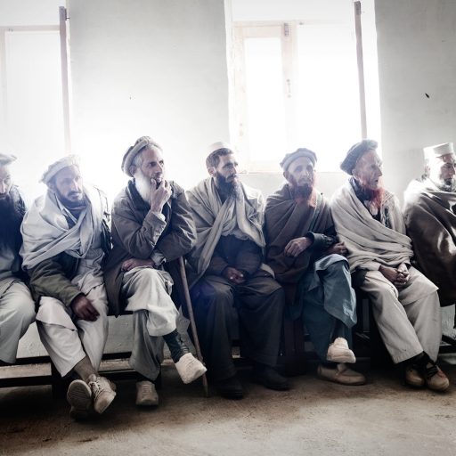 Village leaders gather together during a "Shura", or meeting, between the U.S. army and local civilians in the Korengal Valley, Kunar province, Afghanistan on Dec. 24, 2009. These leaders are all former Mujahideen who fought iduring the Soviet occupation in the 1970s.
