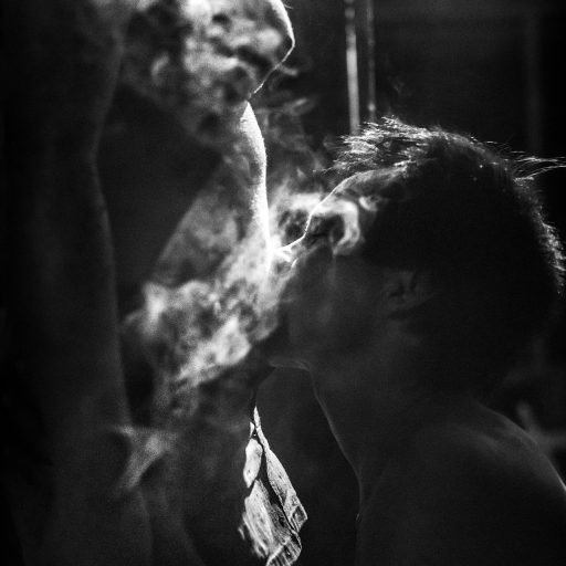 In November, 2015, Aladino, a native Bora shaman, blows cigarette smoke on to the body of a patient.  He starts the natural healing process blowing smoke, from a blessed cigarette, all over the patient’s body. A young girl called Tania, had been cursed by some enemies from a rival tribe and her whole body was full of wounds. Being a curse, this healing process will probably take days and to be really effective, they have to happen only at night. Aladino needs to be concentrated to be guided by the ancients Bora spirits and unveils who is responsible for Tania's malediction.