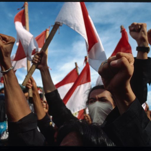 College students unite and call for Suharto to step down as president of Indonesia in front of the MPR, parliament building, Jakarta, Indonesia. Days later, Suharto resigned due to mass protests.May 1, 1998Photo by: John Stanmeyer / VII