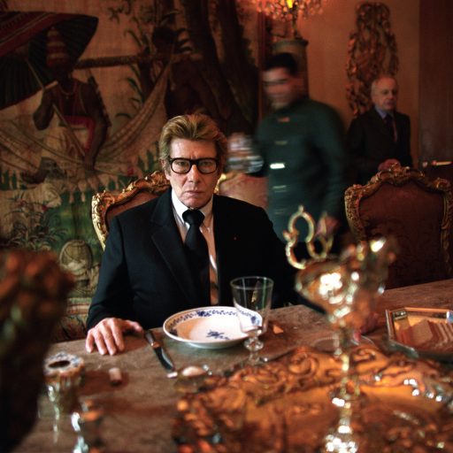Yves Saint Laurent having lunch at home in Paris, the day before his last haute couture show in Georges Pompidou Centre, Jan. 21, 2002. The show marked the retirement of Yves Saint Laurent after 40 years of designing haute couture for the rich and famous.Photo by: Alexandra Boulat / VII