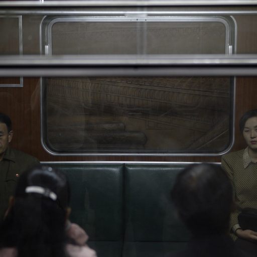 Passengers riding in silence on a commuter train in the North Korean capital Pyongyang, Oct. 14, 2005.
