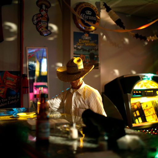 A cowboy at La Esquina, The Corner Lounge, on Friday night in downtown Marshall, Missouri.