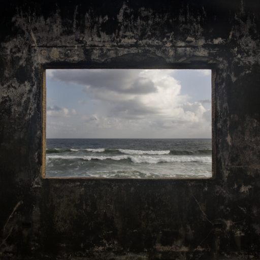 A view of the Atlantic Ocean is seen from one of the demolished villas of the Tortoise community in Monrovia, Liberia on Sept. 14, 2008.