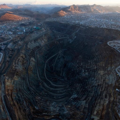 The open-pit mine operated by Volcan is seen in the center of the city of Cerro de Pasco, Peru, photographed from a hot air balloon.