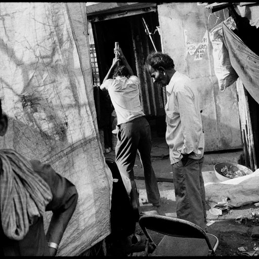 Daily life in Mumbai, Maharashtra, India on Feb. 25, 2009. Wars however unwelcome are violent interludes in the lives of the poor - there is less chance of outrunning poverty. When wars end the poor are still stalked by fear, fear of disease, injustice, unemployment, of getting sick, no housing and no education for their children - afraid their last meal was their last meal.