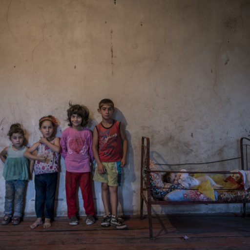 The six children of Varduhi Chobanyan, 31, pose for a portrait in Nor Erkej village, Nagorno-Karabakh, on July 15, 2017. The children's family lived in poor conditions, not having enough beds. A new house was built for them nearby by the government, where they moved in early 2020. Nor Erkej, being in the Kalbajar region, came under Azerbaijan's control after the Nagorno-Karabakh war in Fall 2020.

There has been a conflict in Nagorno-Karabakh in the South Caucasus, for decades, with fighting between Armenian and Azerbaijani forces. In 1994, after six years of war, a ceasefire was concluded, but violence has continued along the contact line between the unrecognized republic of Nagorno-Karabakh, and Azerbaijan, breaking out into a 45-day war in Fall 2020.