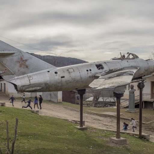 Children in Mets Tagher village, Hadrut region, play and run around an airplane that belonged to a WWII Marshal from this village in Nagorno-Karabakh, on February 28, 2020.

There has been a conflict in Nagorno-Karabakh in the South Caucasus, for decades, with fighting between Armenian and Azerbaijani forces. In 1994, after six years of war, a ceasefire was concluded, but violence has continued along the contact line between the unrecognized republic of Nagorno-Karabakh, and Azerbaijan, breaking out into a 45-day war in Fall 2020.