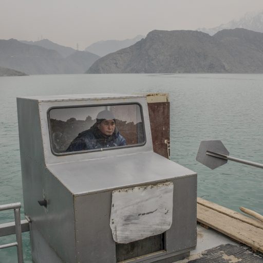 Kyrgyzstan: Sonunbek Kadyrov’s boat serves the village Kyzyl-Beyit, as a taxi. Access to this village’s main road was covered by water over 20 years ago as a dam was built, in a case when inefficient water management heavily complicated people’s movement.