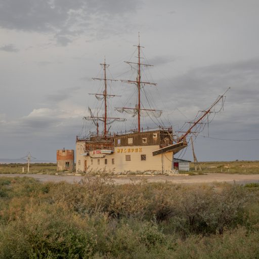 Kazakhstan: A former restaurant, which locals call Titanic, stands abandoned on a steppe near lake Balkhash, in symbolic oddity of a ship on dry land.