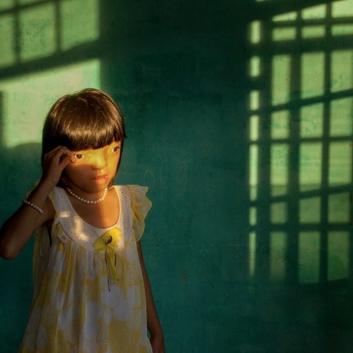 Nguyen Thi Ly, 9, who suffers from Agent Orange disabilities, in her home in Ngu Hanh Son district of Da Nang, Vietnam on July 9, 2010.