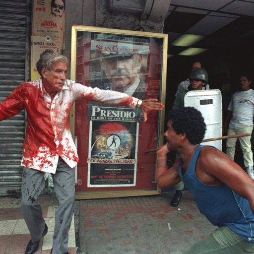 A supporter of Panamanian dictator Manuel Noriega attacks elected Vice President Guillermo (Billy) Ford in Panama City, in an attempt to overturn the election. US President George HW Bush referenced this photograph as one of the justifications for the invasion of Panama by the United States in 1989.