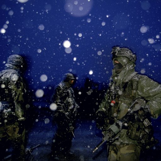 United States soldiers in the snow at night in Brcko Corrido, Bosnia, in the winter of 1995, after they arrived to enforce the Dayton Peace Agreement to end the war in Bosnia.