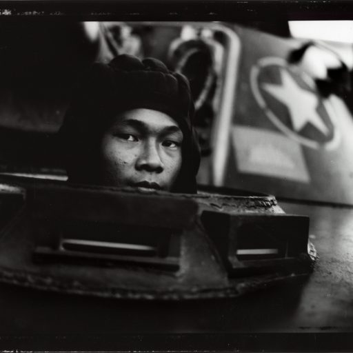 Vietnamese tank-driver in Phnom Penh during Vietnam's withdrawal from Cambodia. Phnom Penh, Cambodia. 1989