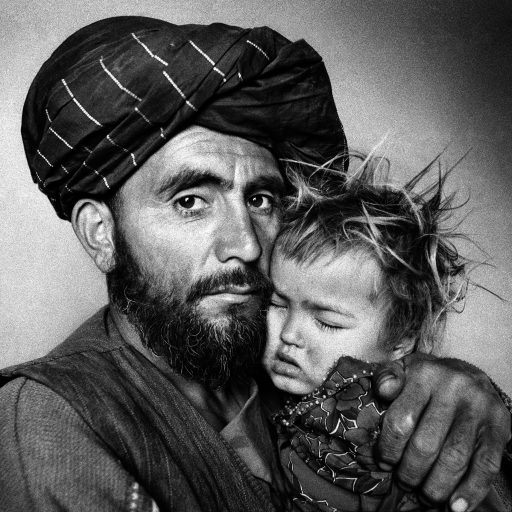 Dasht-e-Qala. Takhar Province November 2000

A father with his daughter, ill with malaria, waits for treatment at a Swedish Committee clinic.