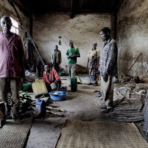 Displaced people seek refuge in a church in the village of Rubare, DR Congo 2008. They fled Ntamugenga after rebels attacked and burned their houses.