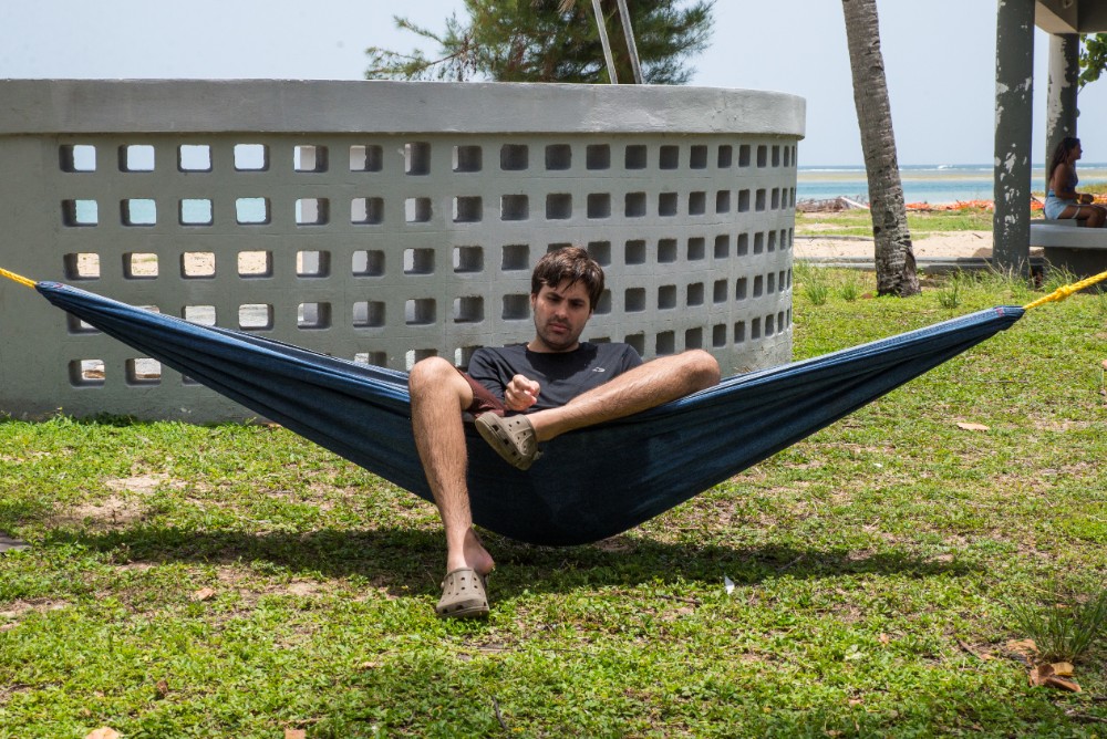  A Camp MAVI client rests in a hammock during an outing to Luquillo Beach. 