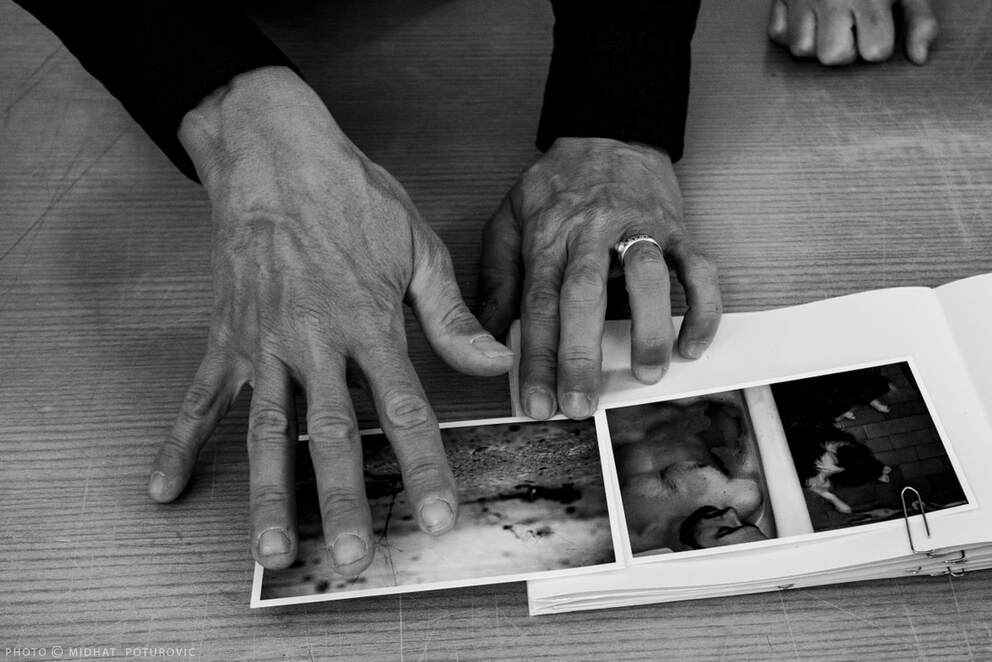 Philip Blenkinsop’s hands by Midhat Poturovic