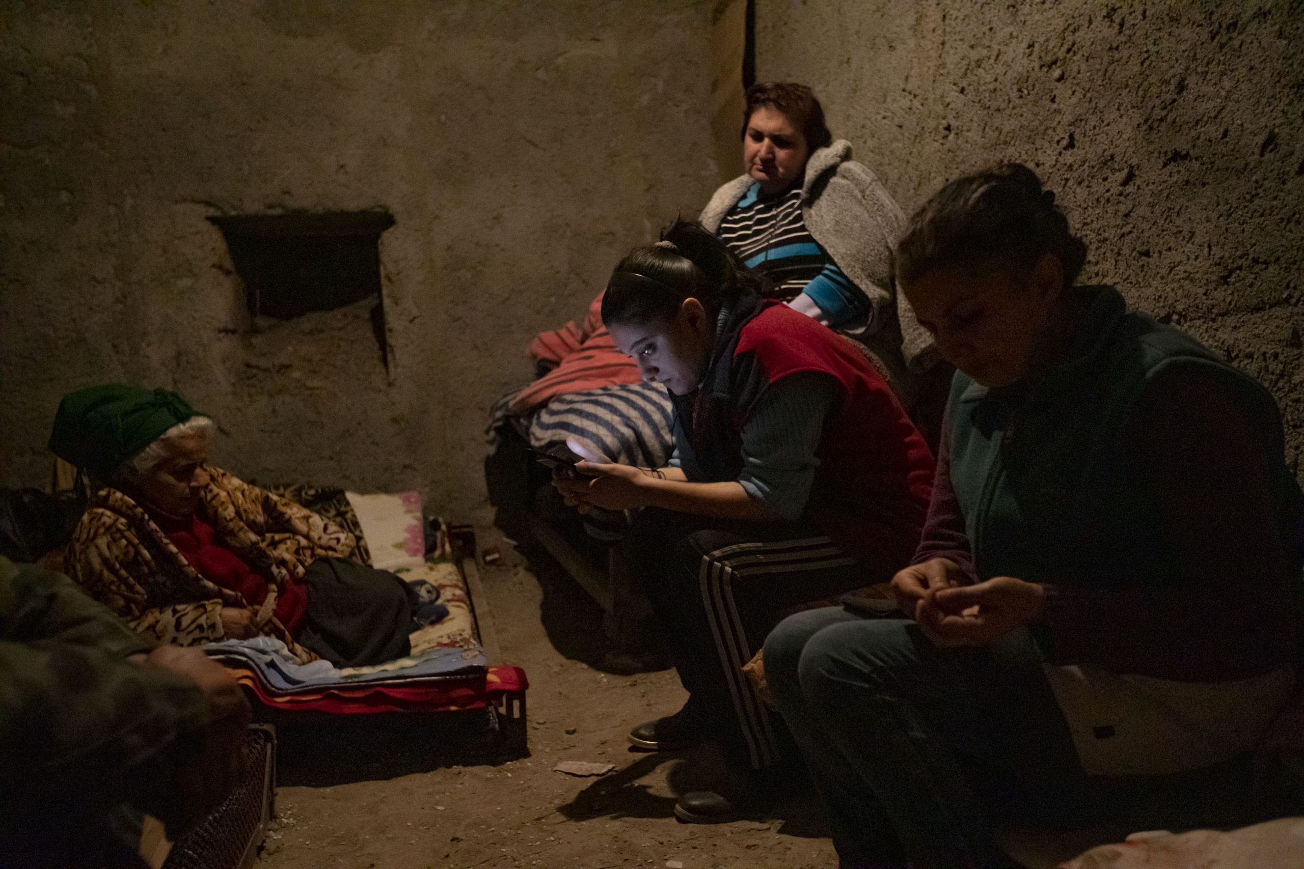 Residents of a five floor building hide in a shelter under their building, in Shushi, Nagorno-Karabakh, on October 16, 2020. The town, which Armenians call Shushi and Azerbaijanis call Shusha, came under Azerbaijan's control by the end of the Nagorno-Karabakh war.