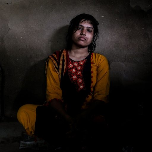 Sapna Monsore, 22, poses for a portrait in her parents home. She was kidnapped in the state of Rajasthan, in northern India, and sold for $50,000 rupees ($700 usd) to 2 men who brutally raped her, and then sold her again in Bangalore, where she was forced to marriage twice. After several months captive, she managed to call her brother Bhagun, who paid her ransom, and took her back home with their parents. She is 5 months pregnant and her father, due to the community's harrassment and discrimination, arranged a marriage with a man of another village.

In the provinces of India, in rural and urban areas, women who have been victims of sexual assault live out their lives, not only trying to cope with the aftermath of this traumatic experience but also with stigma, social judgment, and seclusion. India, according to the Thomson Reuters Foundation, is the most dangerous country in the world to be a woman. Every day hundreds of girls and woman are exposed to sexual violence, human trafficking and sexual and domestic enslavement. This remains not just a problem of gender inequality, but also as one of class, caste, and political and economic power. All these elements, together, speak to a threat that often brings silence and idleness, and unfortunately, makes seeking justice an endlessly painful, complicated path.