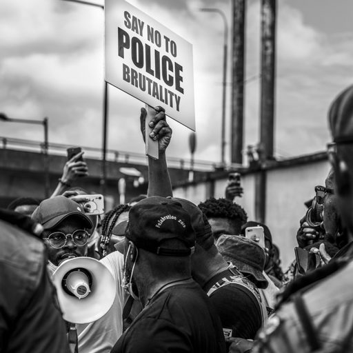Musician Folarin 'Falz' Falana holds up a sign during the anti-police brutality protests in Lagos.