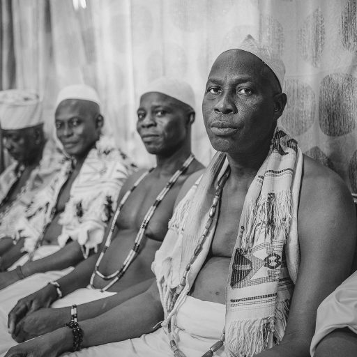 Lagosian community chiefs in traditional dress having a meeting at the King's palace in Lagos.