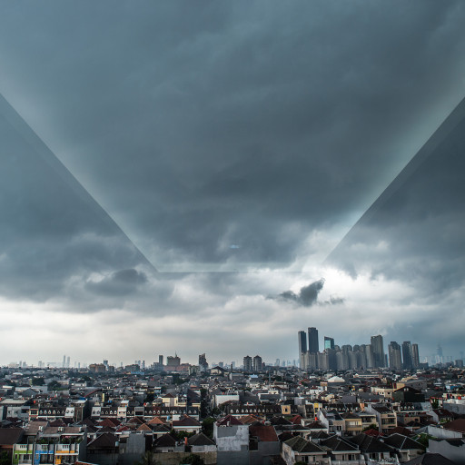 A storm brews outside a window in Jakarta, April 29, 2020.