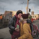 Photo by Espen Rasmussen / VII for VG. Ivanka hugs her 10-year-old daughter Alina at the Medyka border crossing on February 26, 2022. Alina and her cousins Lisa, 21, and Daniel, 12, had to walk 36 km to get to the border crossing. Ivanka was working in Poland when the war broke out and had not seen her daughter for two weeks.