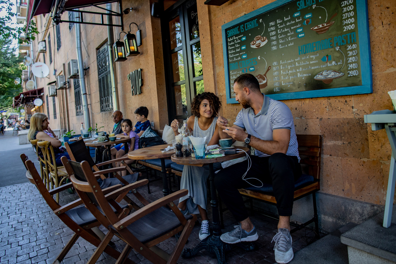 Couple in a cafe at Yerevan’s Cascade, in Armenia on September 12, 2018. ©Anush Babajanyan / VII
