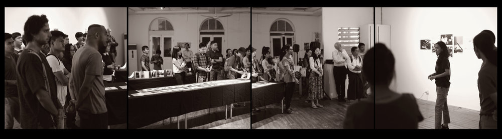 Rita Khin introducing her work to the gathered audience for the "Burmese Days" exhibition on the final night in Rangoon. © Philip Blenkinsop / VII Photo