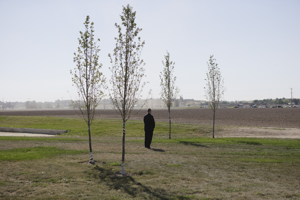 A U.S. Secret Service agent stands guard during the landing of President Bush's helicopter, Marine One, in Nampa, Idaho, Aug. 24, 2005. ©Christopher Morris / VII