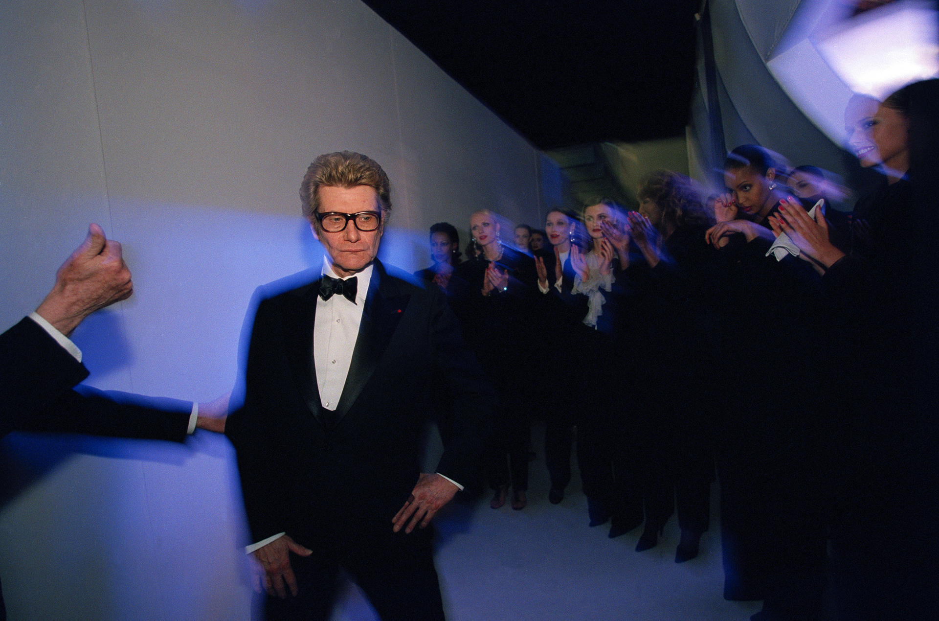 Yves Saint Laurent's last collection. Yves Saint Laurent backstage after his last Haute Couture show inside the Georges Pompidou Museum on January 22. In 2002, Yves Saint Laurent closed the office after 40 years. © Alexandra Boulat / VII.