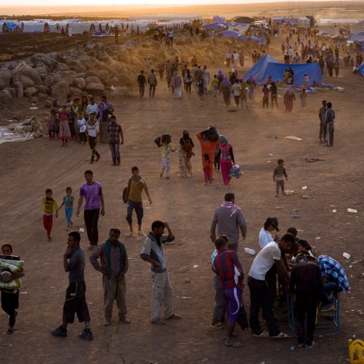 Refugees gather together in Nawrooz Camp in Al Malikiya, Syria on Aug. 10, 214.