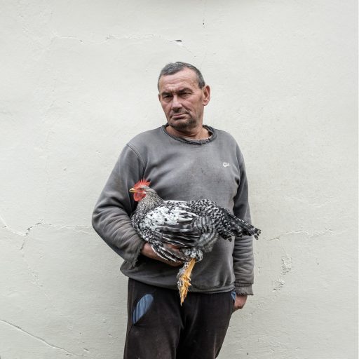 Portrait of Cvijetin, fishing on the river's edge as the war in Bosnia drew to a close. A bomb exploded on the surface of the water, leaving him wounded. The river carries its own tragic stories. Cvijetin is currently in his sixties. ©Mitar Simikic for the VII Mentor Program.