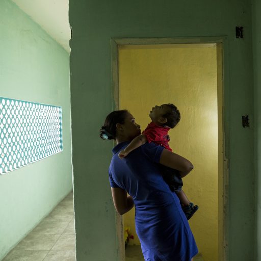 Ana Paula Albuquerque holds her son Danilo Miguel Pessoa da Silva, born with microcephaly due to the Zika virus in Recife, Brazil. ©Adriana Zehbrauskas.