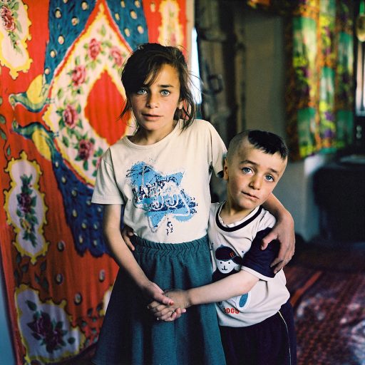 Zulfiya with her six year old brother Behjat at home in Khinaliq village. Azerbaijan. 2006. © Rena Effendi.