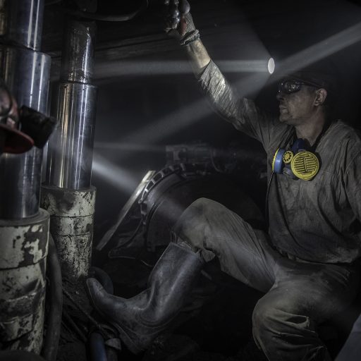 Miners work nearly half a mile underground at a private coal mine run by the DTEK energy company, in the Dobropil district of Ukraine’s eastern Donetsk region, June 9, 2022. The mine is under a private lease to oligarch Rinat Akhmetov, Ukraine’s richest man. © Finbarr O’Reilly.