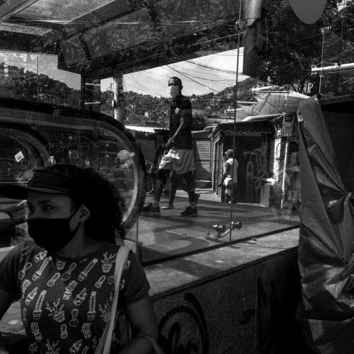On April 24, 2020, there is intense activity at the entrance to the Rocinha favela subway station. Social conditions make isolation practically impossible during the pandemic. © Leonardo Carrato.