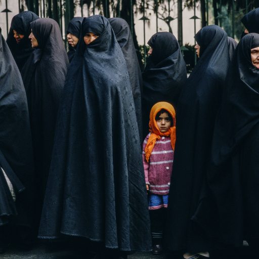 Iran, 1985. In Tehran, women before Friday prayer, including a little girl who, before long, will be swathed in black. © Pascal Maitre.
