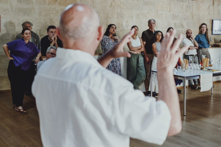 Contributing photographer Pascal Maitre presents his latest work at the VII Community Open Mic Night at The VII Foundation campus in Arles,  France. © Mitar Simikic for The VII Foundation.