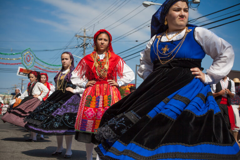Spectators and participants attend the Annual Portuguese Day Festival, or “Dia de Portugal,” in the Ironbound neighborhood of Newark, N.J., on June 14, 2015. A longtime hub for Portuguese immigrants since 1910, the area has recently seen an influx of Brazilian migration and continues to grapple with Superfund sites from its industrial past. © Ashley Gilbertson / VII.