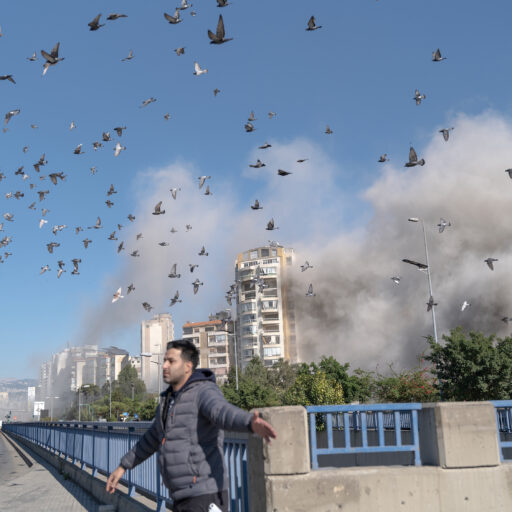 Israel targeted multiple buildings in seconds in a residential area in the southern suburbs of Beirut, Lebanon.This occurred during the first few minutes of a Hezbollah press conference where all major media outlets were invited to attend in the southern suburbs of Beirut. When Israel issued evacuation orders and journalists all hurried to leave. Some journalists headed to an area, facing two buildings soon to broadcast its destruction, Lebanon. October 22, 2024. © Ali Khara.