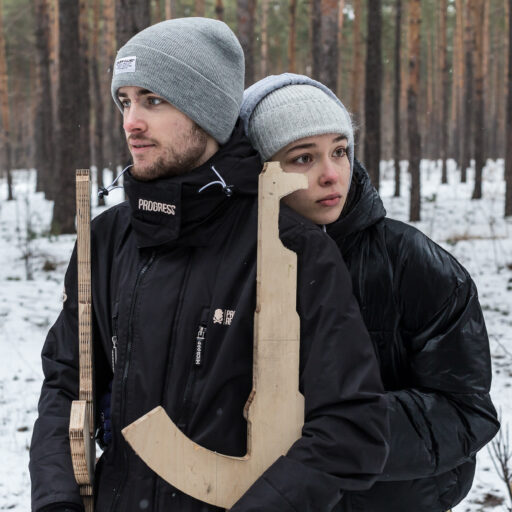 A couple Sofia Chygyryn, 19, and Vadym Beilakh, 19, pose for a portrait during the territorial defense training in Kyiv, Ukraine on February 5, 2022. Sofia, student in business psychology, and Vadym, student in management, both also work on the side, came to the training for the first time in order to prepare while the situation is still peaceful. They said “Prepare for the worse, believe in the best”. They said they are lucky that they didn’t see people in the military uniforms 8 years ago. They packed emergency bag few days ago and they worry most to lose somene. They added that "every citizen is responsible for the situation and for his family". In recent months, Russia has amassed roughly 130,000 troops and military equipment near the Ukrainian border, raising the tension and worries of a possible larger scale invasion into Ukraine. Ukraine has been at war with Russia for 12 years now, when in 2014 Russia annexed Crimea and launched the conflict in eastern Ukraine by fuelling separatist sentiments, sending troops and supporting pro-Russian forces. © Oksana Parafeniuk.