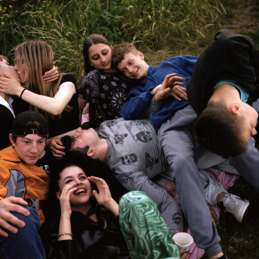 I called home project, 2022-2023. Ukrainian teenagers celebrate a birthday along the banks of the Oder River in Frankfurt (Oder), Germany, summer 2022. Many Ukrainian families arrived in the city after fleeing the Russian invasion of Ukraine earlier that year. © Tanya Sharapova.