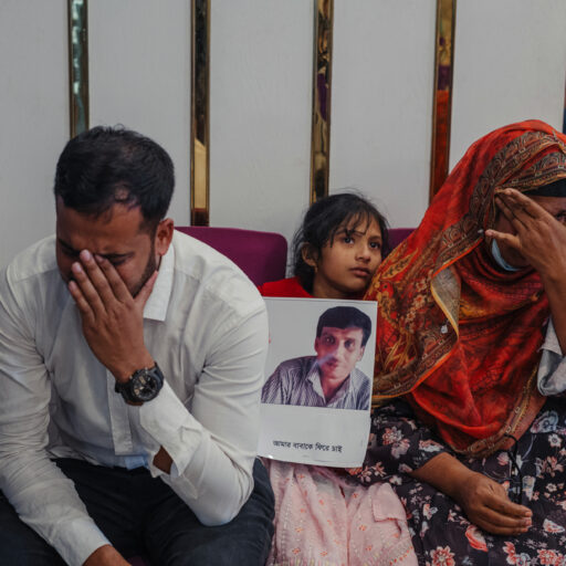 After the fall of Sheikh Hasina on 5 August 2024, the interim government formed an Inquiry Commission on Enforced Disappearances to investigate cases across the country and identify victims. In Rajshahi, a consultation was jointly organized by the United Nations, the Inquiry Commission, and Maayer Daak, where families gathered to share their testimonies and long years of uncertainty, grief, and search for justice.
Fawzia, the eight-year-old daughter of Md. Murshidul Islam—who was forcibly disappeared on 19 April 2017—sat among them, carrying a story shaped by absence, waiting, and unanswered questions.This photo was taken on December 21,2024. © Mosfiqur Rahman Johan.